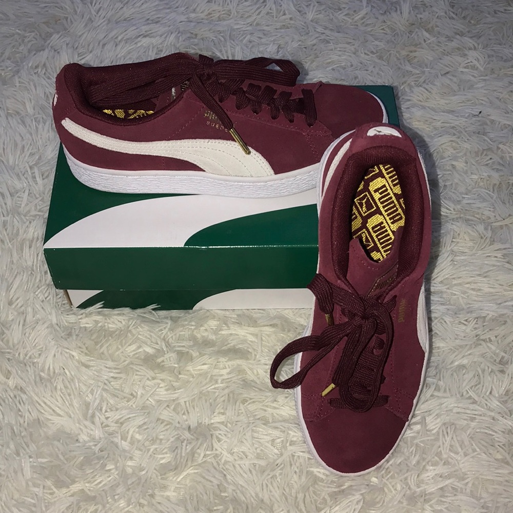 Burgundy pumas